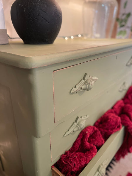 4 Drawer Dresser with Carved Wood Poles in Sun-Dried Olive