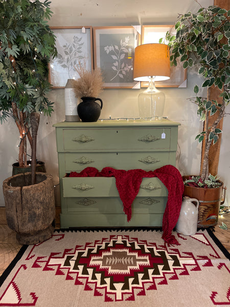 4 Drawer Dresser with Carved Wood Poles in Sun-Dried Olive