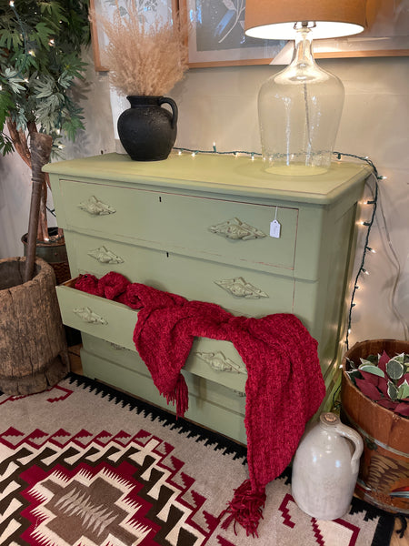 4 Drawer Dresser with Carved Wood Poles in Sun-Dried Olive