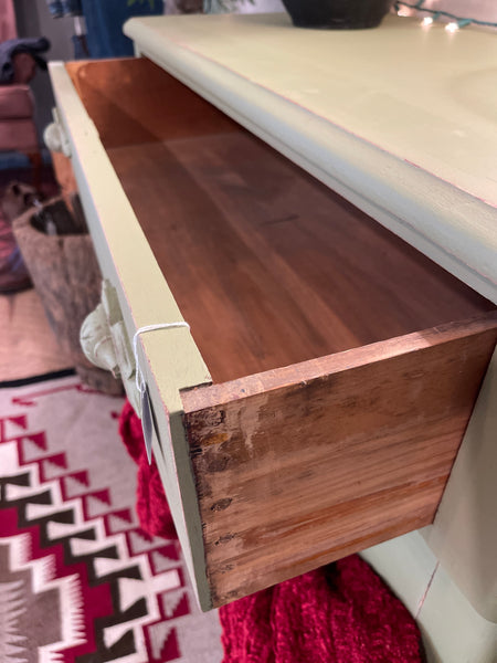 4 Drawer Dresser with Carved Wood Poles in Sun-Dried Olive